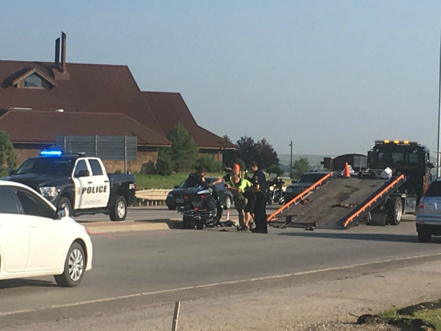 Two injured in Rapid City car vs. motorcycle accident